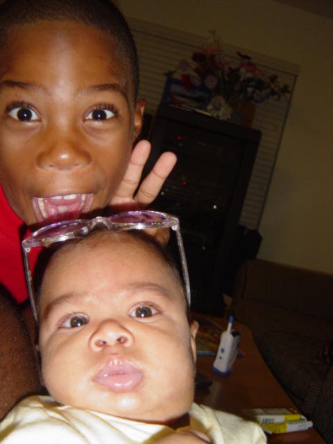 Rabbit ears everytime we take pictures together.
